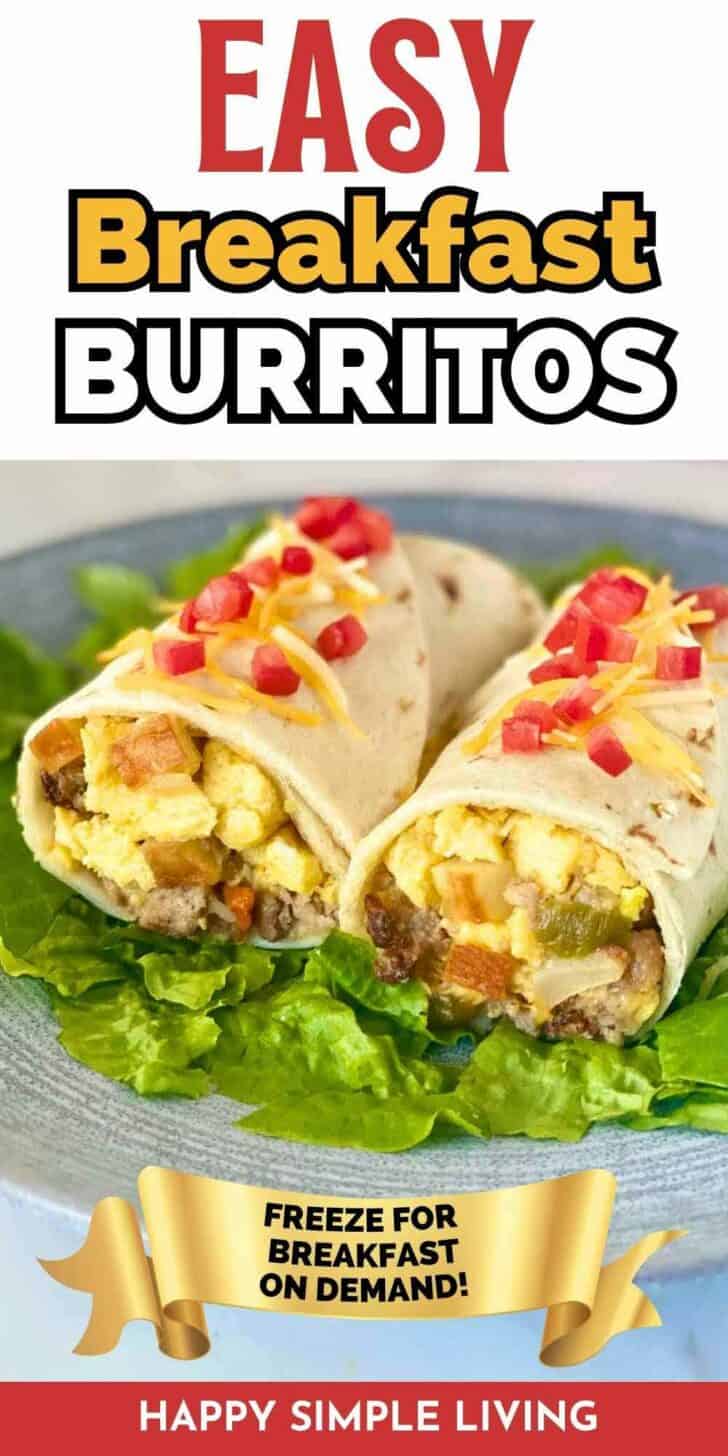 A breakfast burrito ready for serving and garnished with cheddar cheese and tomato.