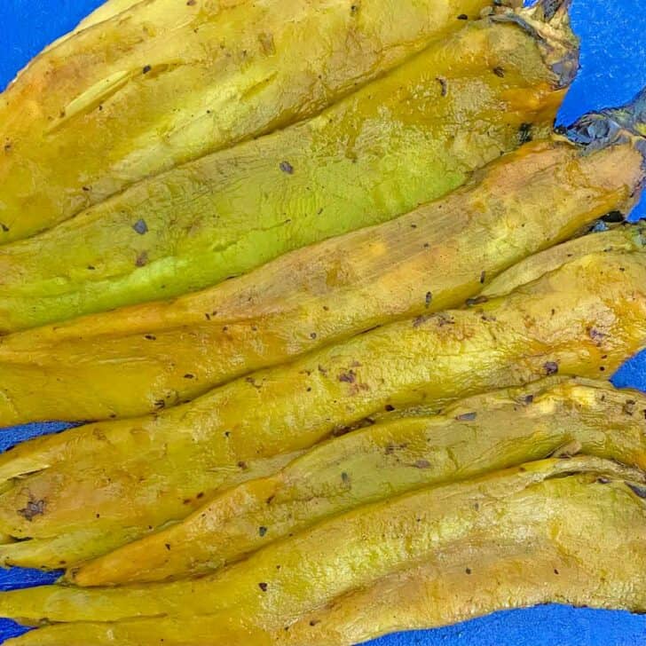 Peeled fire roasted green chile peppers.